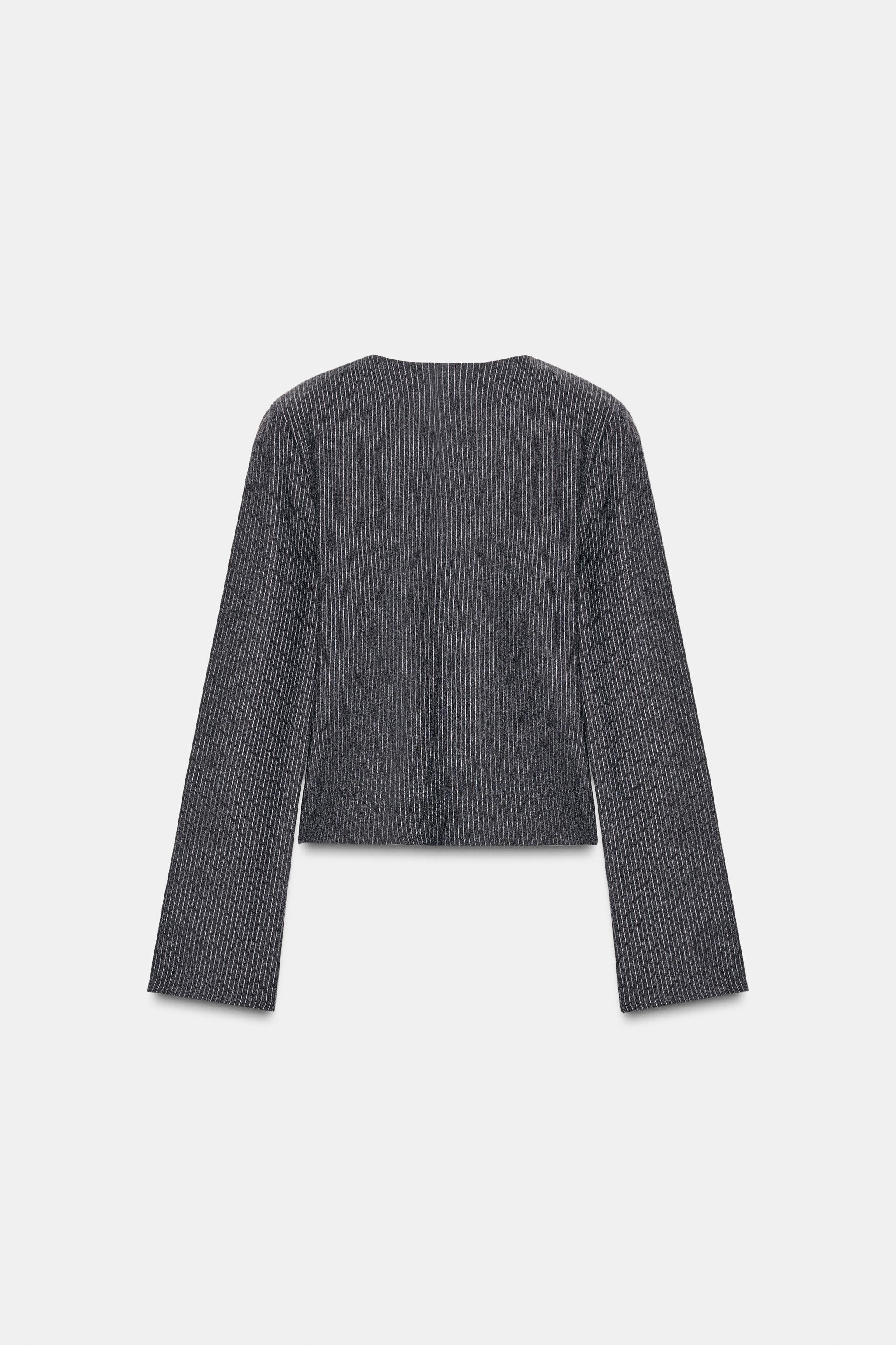 PINSTRIPED SHOULDER PAD TOP